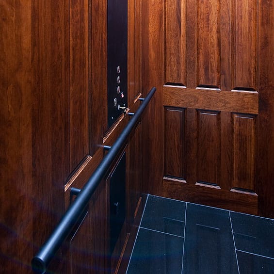 Indoor home wood walled elevator by Savaria