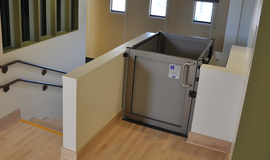 Vertical wheelchair lifts