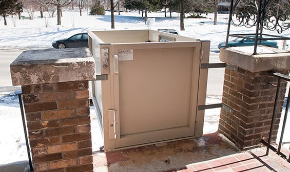 Vertical Wheelchair Lift outdoors in the snow