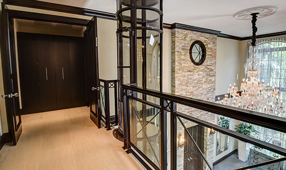 Pneumatic elevator on the second floor landing of a luxury home