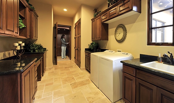 Residential elevator inside luxury home kitchen