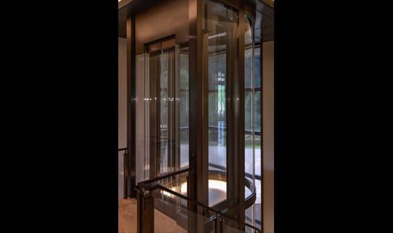 Glass residential elevator