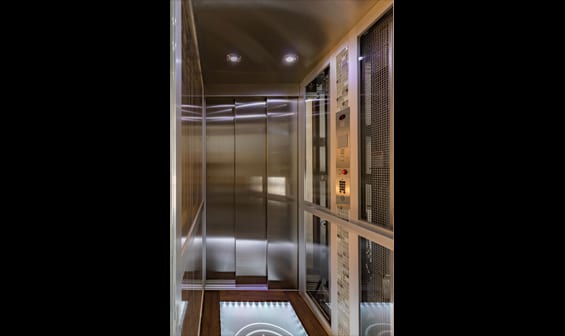 Home elevator glass