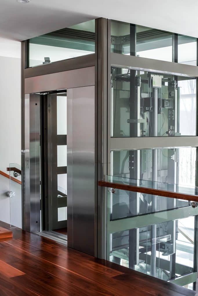 Garaventa glass elevator with metal trim