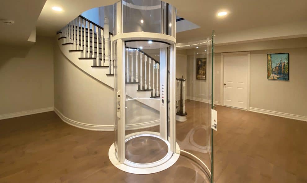 Round glass elevator in luxury home